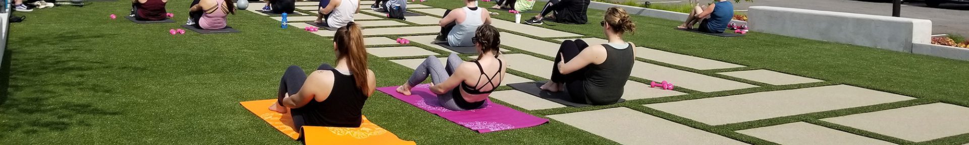 women doing outdoor yoga at Mellody Farms