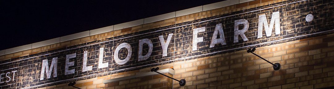 Mellody Farm sign lit up