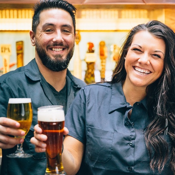 Couple smiling with beer mugs Mellody Farm Vernon Hills illinois